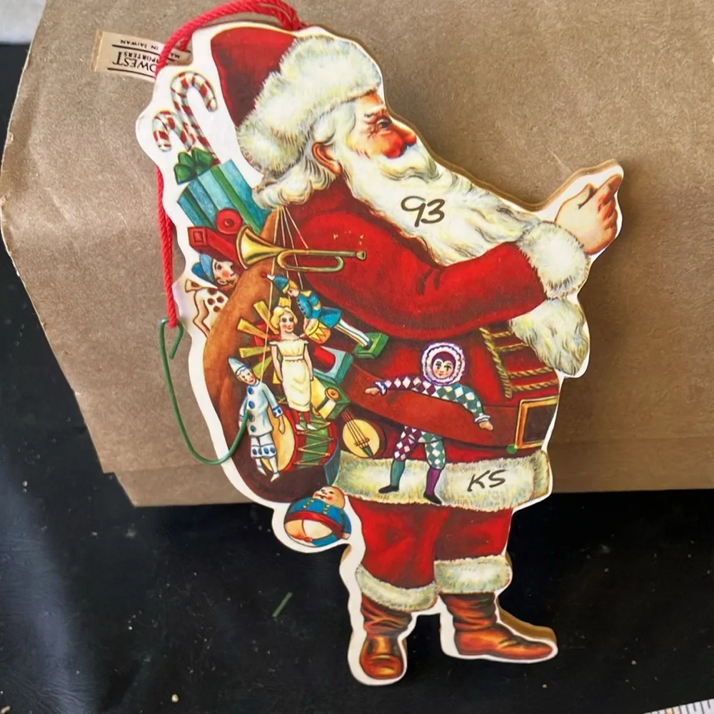 Vintage pressboard Santa ornament